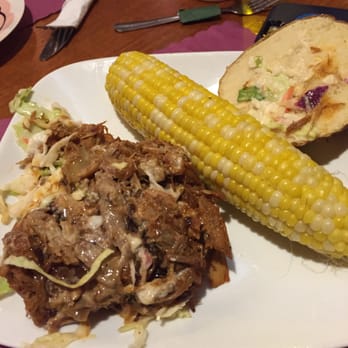 Barnsider Barbeque Restaurant - Pulled pork on a pretzel bun. - Barbeque Near Me - Lake George, New York Barnsider Barbeque Restaurant - Pulled pork on a pretzel bun. - Barbeque Near Me - Lake George, New York