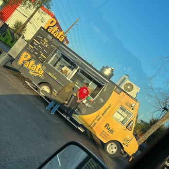Patatabar - a yellow food truck parked in a parking lot - Food Trucks Near Me - Houston, Texas Patatabar - a yellow food truck parked in a parking lot - Food Trucks Near Me - Houston, Texas