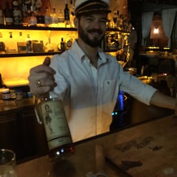 The captain pours the drinks