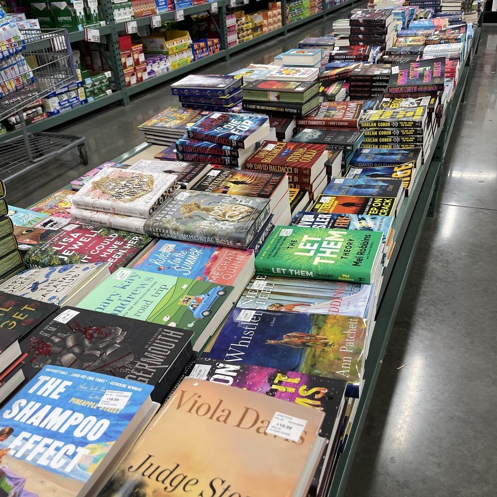BJs Wholesale Club - The long table of new novels, non-fiction and children's books - Wholesale Stores Near Me - Saint Johns, Florida