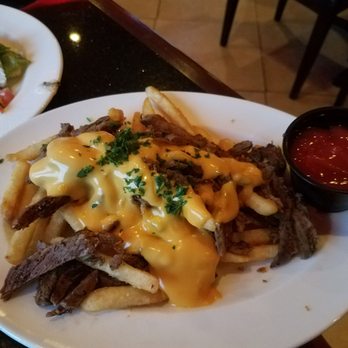 Casablanca - Crispy cheese fries with beef shawarma - Middle Eastern Near Me - Milwaukee, Wisconsin Casablanca - Crispy cheese fries with beef shawarma - Middle Eastern Near Me - Milwaukee, Wisconsin