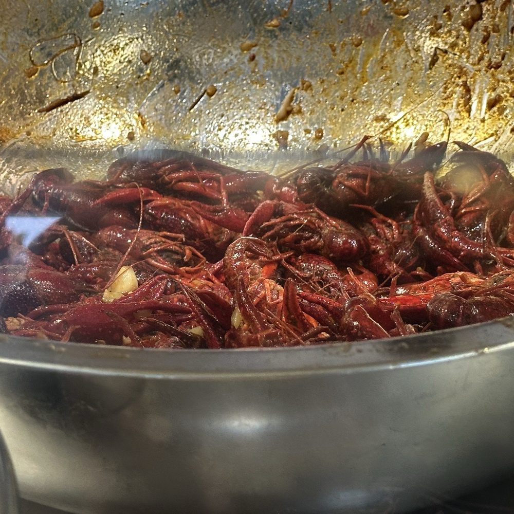 Crawfish Bros - Crawfish poured in large metal bowls and weighed out according to orders - Cajun/Creole Near Me - San Jose, California Crawfish Bros - Crawfish poured in large metal bowls and weighed out according to orders - Cajun/Creole Near Me - San Jose, California