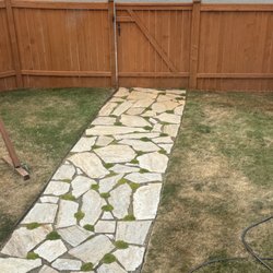 Rock Solid Fence - Stain overspray on stone walk