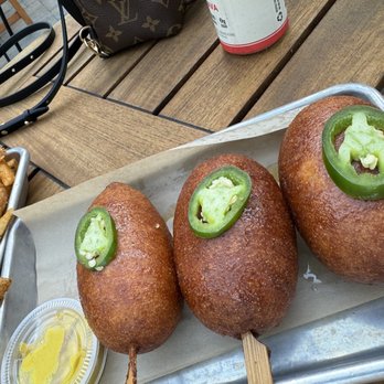 Hangar 24 Craft Brewing - Bacon wrapped beer battered corn dogs - Venues & Event Spaces Near Me - Irvine, California Hangar 24 Craft Brewing - Bacon wrapped beer battered corn dogs - Venues & Event Spaces Near Me - Irvine, California