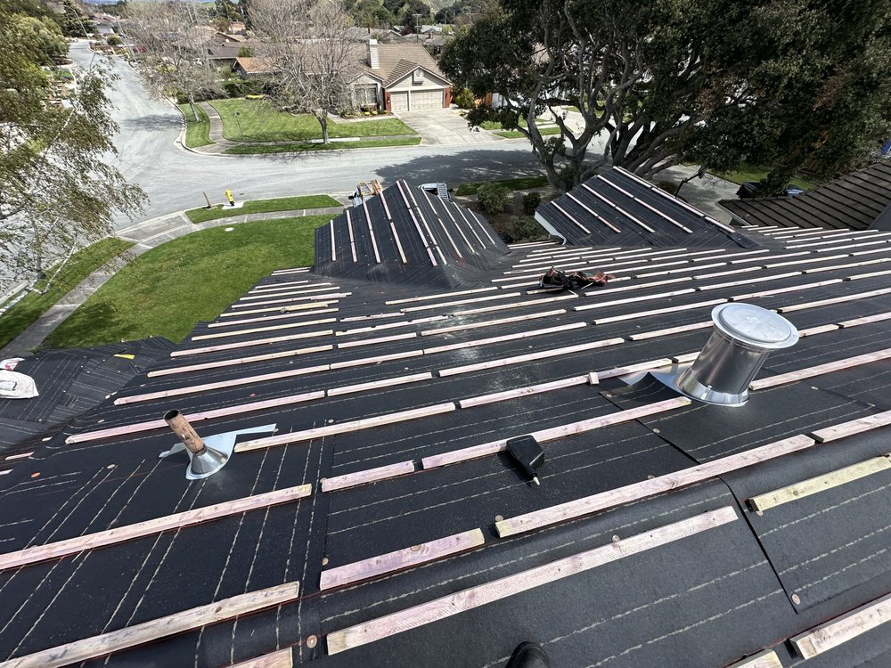 Slide of Vigil Roofing