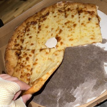 Minocqua Pizza Company - Cheese bread grease. - Pizza Near Me - Minocqua, Wisconsin Minocqua Pizza Company - Cheese bread grease. - Pizza Near Me - Minocqua, Wisconsin