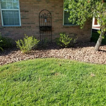 Cuts N Beyond - Weeded flower beds, and added red rocks. - Lawn Services Near Me Cuts N Beyond - Weeded flower beds, and added red rocks. - Lawn Services Near Me