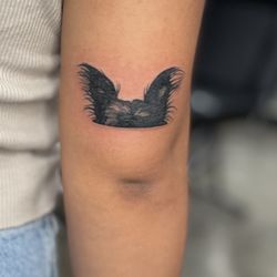 Rich in Flesh Tattoo - Dog ear tattoo
