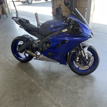 The Moving Moto - My bike in the garage they got for us. - Towing Near Me