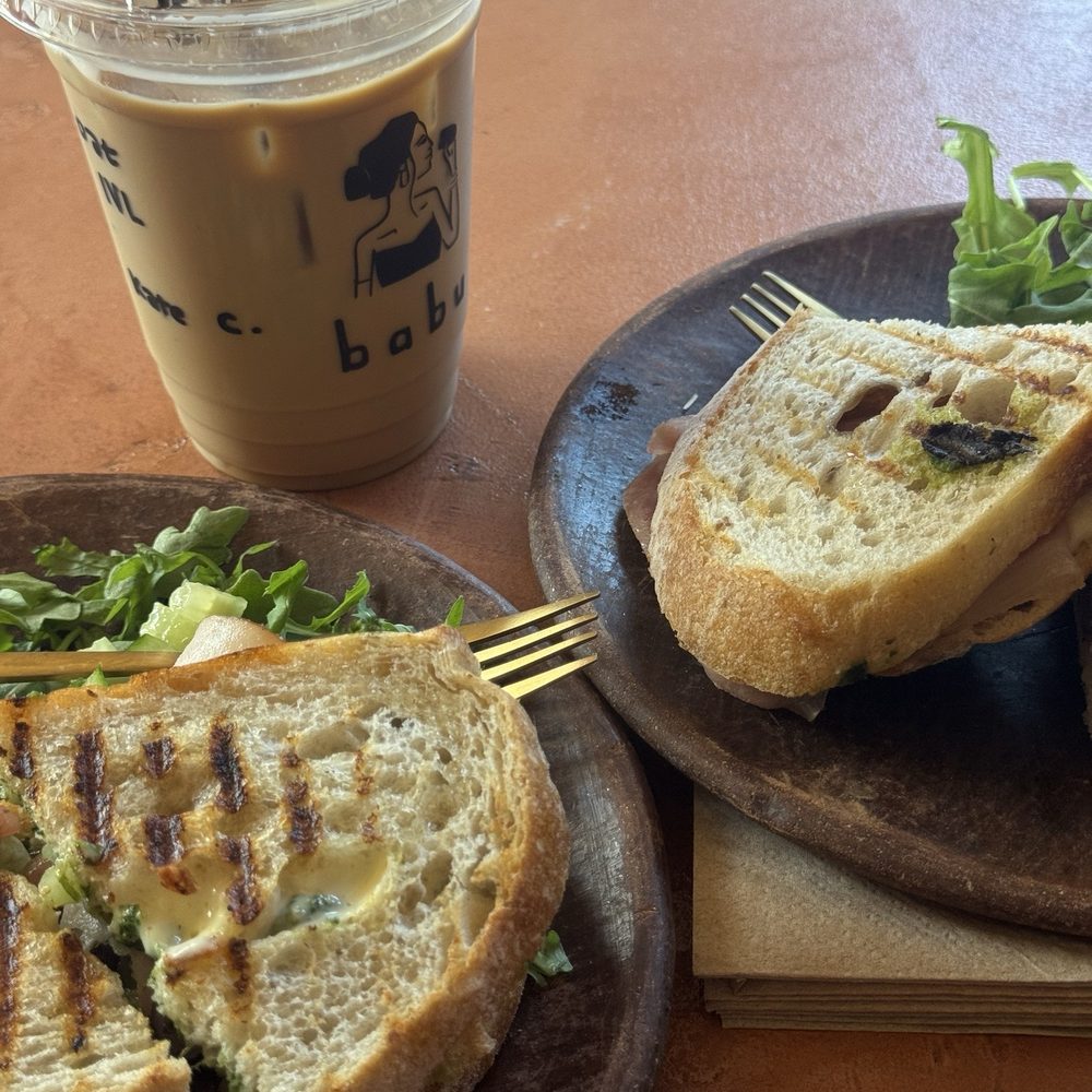 Cafe Babu - Iced Matcha latte with a Mumbai veggie sandwich with turkey - Coffee & Tea Near Me - Nashville, Tennessee Cafe Babu - Iced Matcha latte with a Mumbai veggie sandwich with turkey - Coffee & Tea Near Me - Nashville, Tennessee