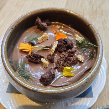 Ladino - Chocolate mousse pudding with edible flowers - Mediterranean Near Me - San Antonio, Texas