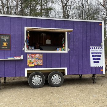 Purple Snack Shack - a blue truck parked in front of it - Food Trucks Near Me Purple Snack Shack - a blue truck parked in front of it - Food Trucks Near Me