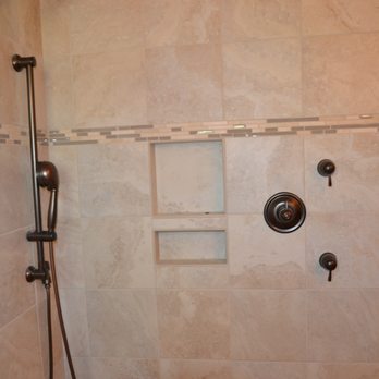 Custom Tile & Interiors - a shower in a bathroom - Building Supplies Near Me - Summerville, South Carolina Custom Tile & Interiors - a shower in a bathroom - Building Supplies Near Me - Summerville, South Carolina