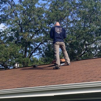 Chicagoland Home Inspectors - A.J. inspecting the roof. - Home Inspectors Near Me - Northbrook, Illinois Chicagoland Home Inspectors - A.J. inspecting the roof. - Home Inspectors Near Me - Northbrook, Illinois