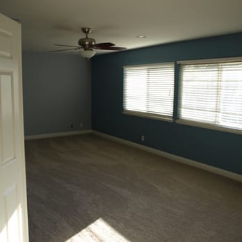 Carpet on the Road - an empty room with a ceiling fan - Flooring Near Me - Santa Ana, California Carpet on the Road - an empty room with a ceiling fan - Flooring Near Me - Santa Ana, California