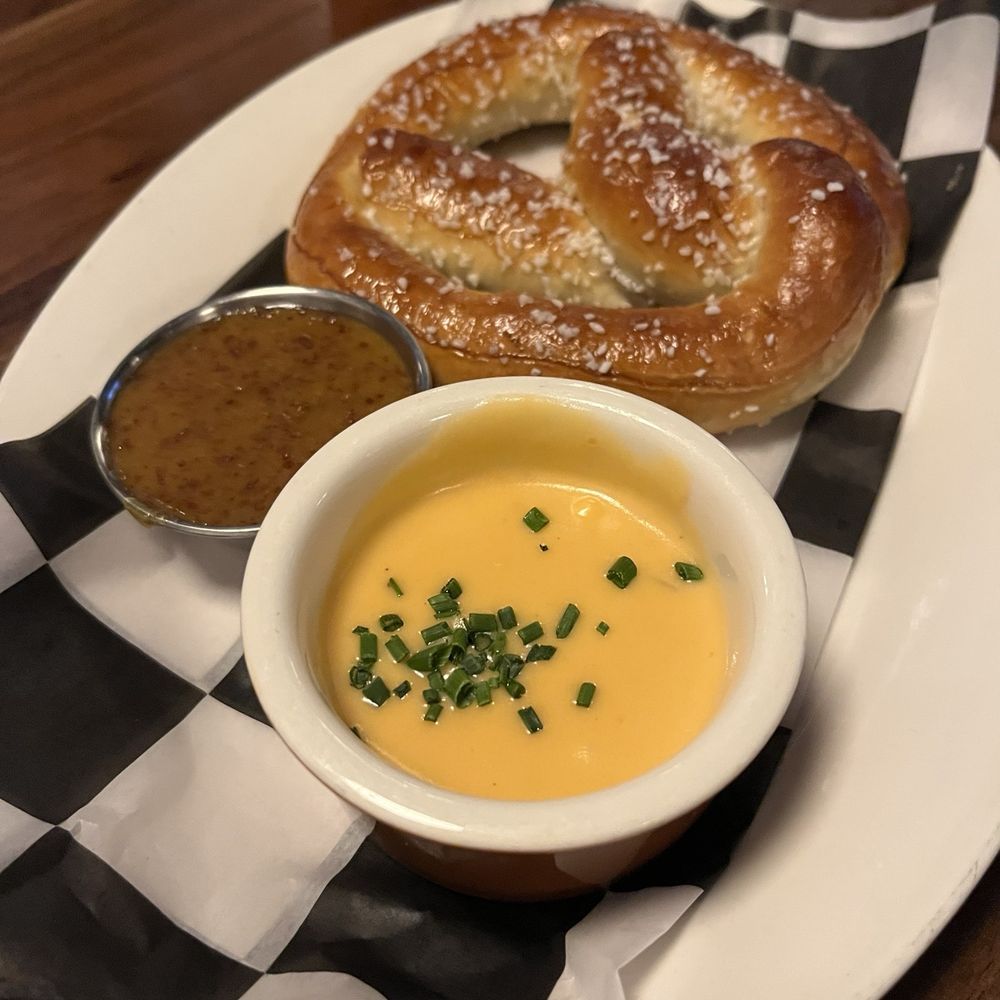 Warm pretzel with beer cheese & honey mustard