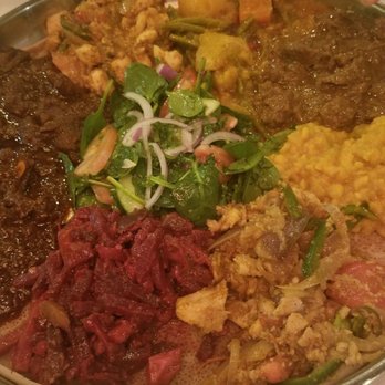 Demera - Chef's selection including 1 beef, 1 lamb, 1 chicken and 4 veggies - Ethiopian Near Me - Chicago, Illinois Demera - Chef's selection including 1 beef, 1 lamb, 1 chicken and 4 veggies - Ethiopian Near Me - Chicago, Illinois