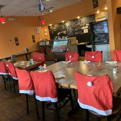 Lai Thai Kitchen - Chairs decorated for Christmas.