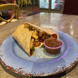 Cafe Waikiki - Breakfast burrito falling apart :')