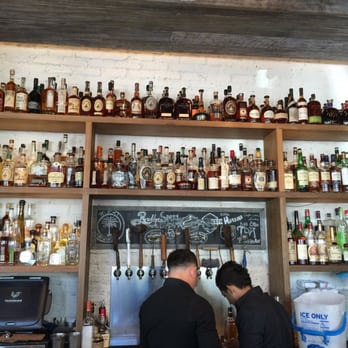 Yardbird Table & Bar - Check out the huge selection of hard to find bourbons, whiskies and eyes on the wall. The list can't keep up! - Southern Near Me - Miami Beach, Florida Yardbird Table & Bar - Check out the huge selection of hard to find bourbons, whiskies and eyes on the wall. The list can't keep up! - Southern Near Me - Miami Beach, Florida