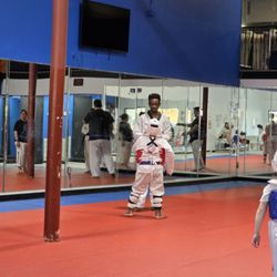 Legacy Martial Arts - Coach demonstrating the next move