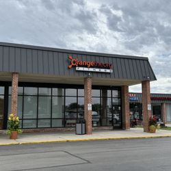 Orangetheory Fitness - Strip mall storefront.