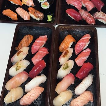 Sushi Yasu Tanaka - Omakase platters (bottom), salmon omakase (top left), tuna omakase (top right) - Sushi Bars Near Me - Miami, Florida Sushi Yasu Tanaka - Omakase platters (bottom), salmon omakase (top left), tuna omakase (top right) - Sushi Bars Near Me - Miami, Florida