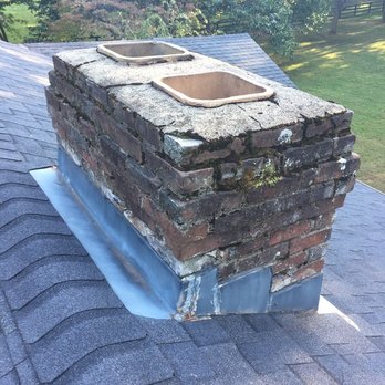 Bone Dry Roofing - Before: From the ground, the brick was visibly aged. Once we were atop the roof, the extent of the aging became apparent. - Roofing Near Me - Lexington, Kentucky Bone Dry Roofing - Before: From the ground, the brick was visibly aged. Once we were atop the roof, the extent of the aging became apparent. - Roofing Near Me - Lexington, Kentucky