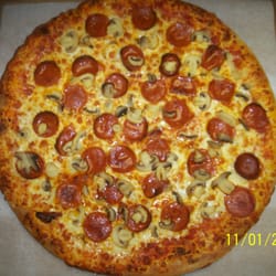 31 Express Deli & Grocery - Large pizza starting at $9.99 plus $1.00 toppings