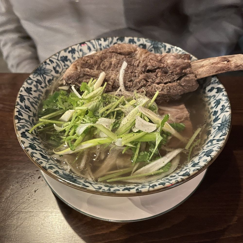 Nhau Vietnamese Kitchen & Bar Logo