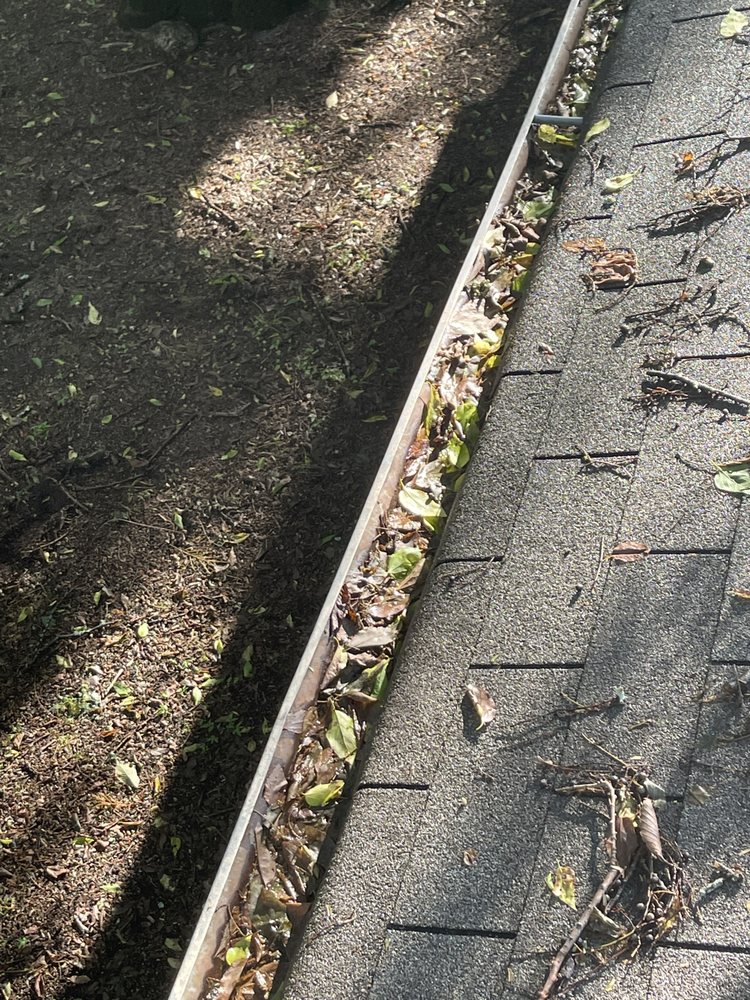 Slide of Marcus Gutters Cleaning