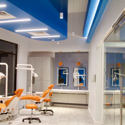 Big Smile Orthodontics - Ortho bay on left and consult room on the right