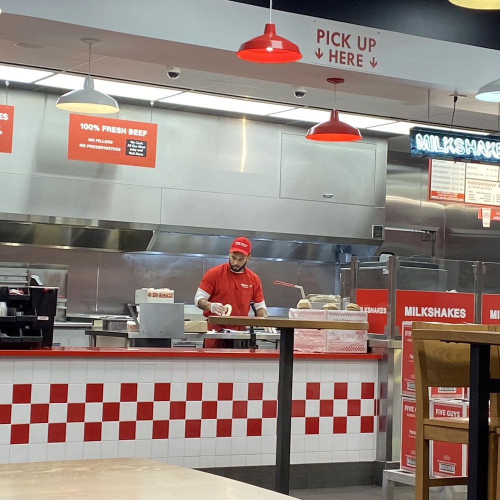 Five Guys - The guy that took our order and washed up to help make food. - Burgers Near Me - Cedar Rapids, Iowa