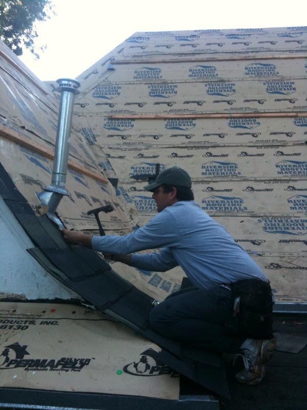 Slide of Watertight Roofing and Construction