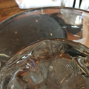 Ambriza - Tiny piece of dried white food stuck to the rim of my water - Mexican Near Me - Houston, Texas