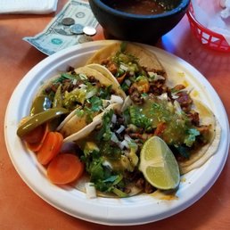 2 tacos asada and 2 pastor. Very good. 2 tacos asada and 2 pastor. Very good.