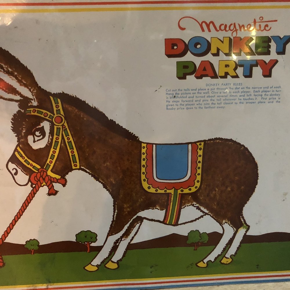 Here's a retro Pin the tail on the donkey!!! So cute donkey with the instructions!! It's metal ! Here's a retro Pin the tail on the donkey!!! So cute donkey with the instructions!! It's metal !