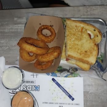 Coco's Crush Bar and Grill - Grilled cheese sandwich and onion rings. - Seafood Near Me - Indian Rocks Beach, Florida Coco's Crush Bar and Grill - Grilled cheese sandwich and onion rings. - Seafood Near Me - Indian Rocks Beach, Florida