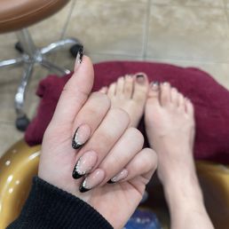 Almond nails, black French tip, deluxe pedicure, French tip. Almond nails, black French tip, deluxe pedicure, French tip.
