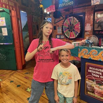 Fudpucker's - My son with the hostess - Seafood Near Me - Destin, Florida
