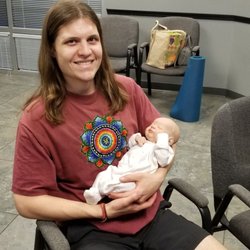 The Childbirth Educator - Holding Judiths mock infant, it looks so real!