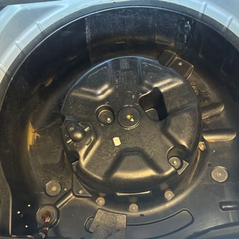 AutoPark Dallas - An Empty trunk where the safety equipment, spare tire, and tools should have been in the car.  No emergency equipment came with the car, - Car Dealers Near Me - Lewisville, Texas