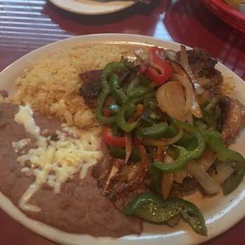 El Azteca Mexican Restaurant - Azteca special - T-bone steak rice re fried beans and veggies. - Mexican Near Me - Attleboro, Massachusetts