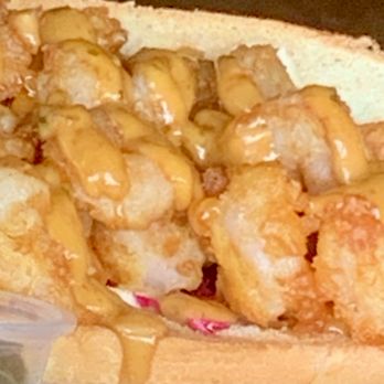 Pounders Restaurant - Shrimp Po Boy absolutely OVER FLOWING with shrimp. - Pizza Near Me - Laie, Hawaii Pounders Restaurant - Shrimp Po Boy absolutely OVER FLOWING with shrimp. - Pizza Near Me - Laie, Hawaii