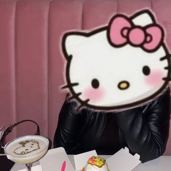Hello Kitty Cafe - In the pink Bow Room with Matcha Sour and a Lemon Tart - Cafes Near Me - Irvine, California