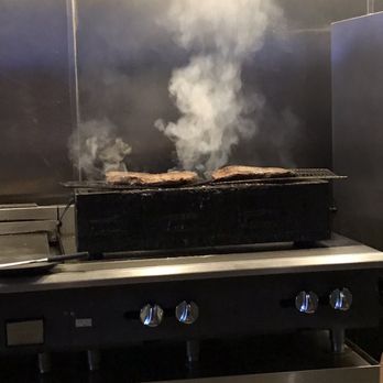 Trust - Meat cooking over coals - Tapas/Small Plates Near Me - Santa Ana, California Trust - Meat cooking over coals - Tapas/Small Plates Near Me - Santa Ana, California