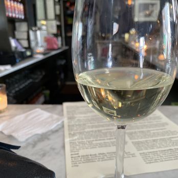 Fishtown Social - a glass of wine on a table - Wine Bars Near Me - Philadelphia, Pennsylvania Fishtown Social - a glass of wine on a table - Wine Bars Near Me - Philadelphia, Pennsylvania