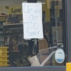 Dollar General - The professional photo they left to let people know they were closing early.