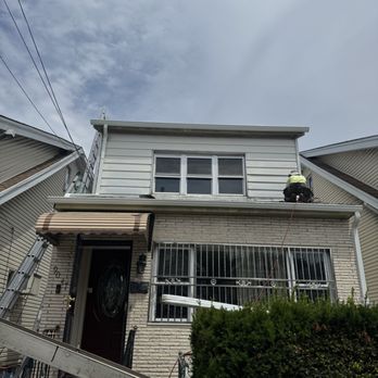 Manhattan Roofing - New gutters, and new shingles installed - Roofing Near Me - New York, New York Manhattan Roofing - New gutters, and new shingles installed - Roofing Near Me - New York, New York