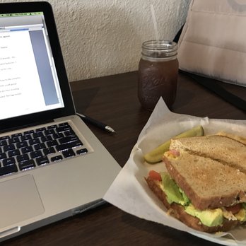 ChadLou's Coffee Roasters - Sitting at the 1980s desk with a delicious sandwich. - Coffee & Tea Near Me - Kailua, Hawaii ChadLou's Coffee Roasters - Sitting at the 1980s desk with a delicious sandwich. - Coffee & Tea Near Me - Kailua, Hawaii